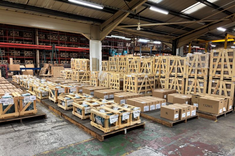 Brook Crompton electric motors delivered on pallets at their warehouse ready for delivery at BAWCo in Bradford, West Yorkshire